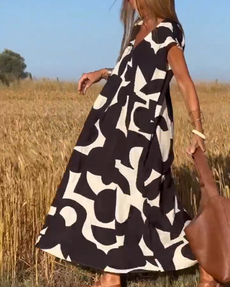 SITA – Printed Dress with V-Neckline