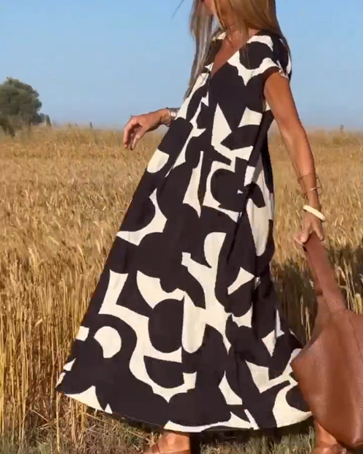 SITA – Printed Dress with V-Neckline